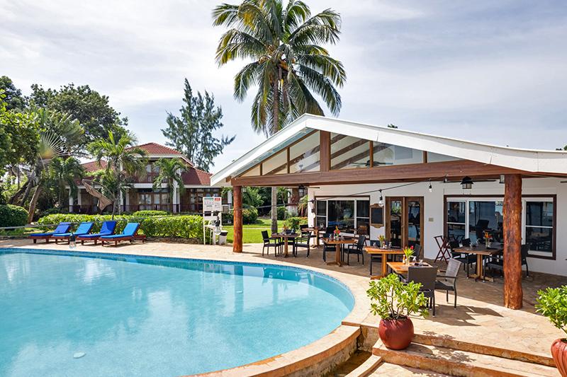 Pool side and indoor dining at Belizean Dreams.